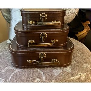 Vintage style stackable suitcase accent pieces that double as attractive storage